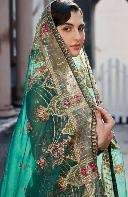 - “Traditional original Pakistani suit with embroidered panels and lace dupatta”
