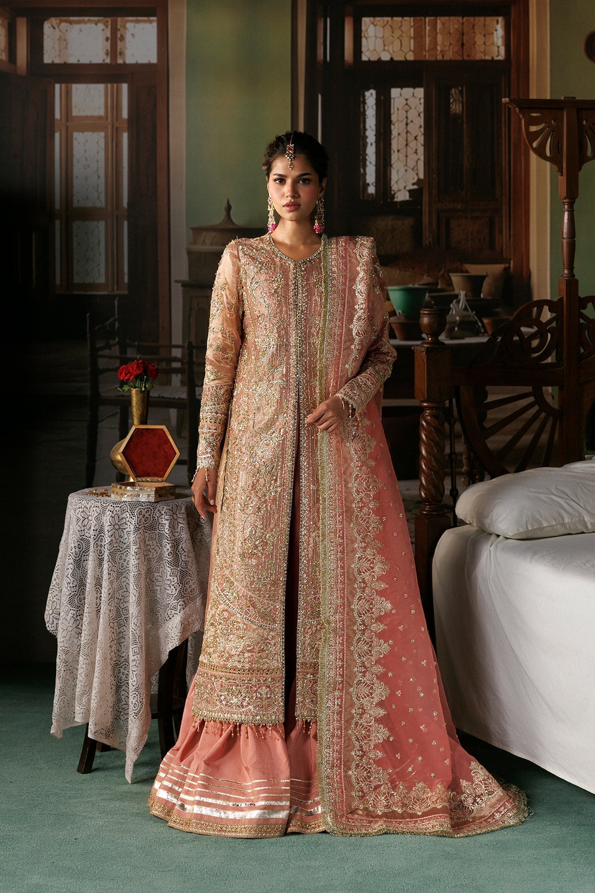 Peach-gold Organza Pakistani bridal suit front view with silver embroidery - Aangan