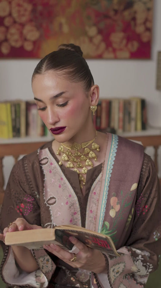 • 	Qalamqar QLine suit in authentic Pakistani design