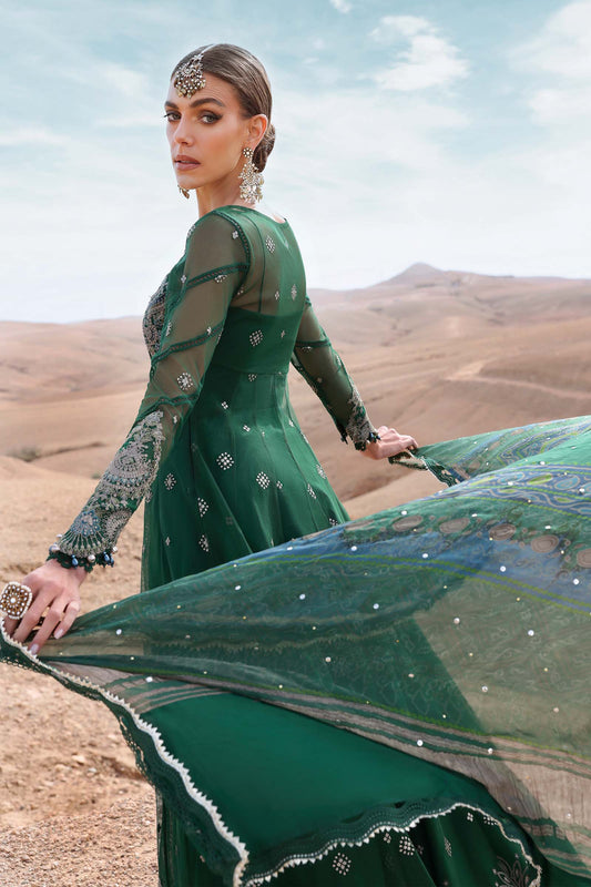 Maria B Luxury Lawn 2025 – unstitched embroidered suit with printed dupatta and cambric trousers, ideal for festive and formal wear.