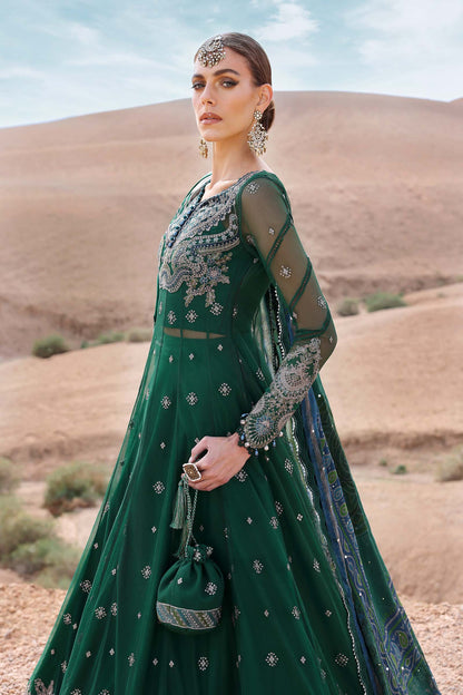 Maria B Luxury Lawn 2025 – unstitched embroidered suit with printed dupatta and cambric trousers, ideal for festive and formal wear.