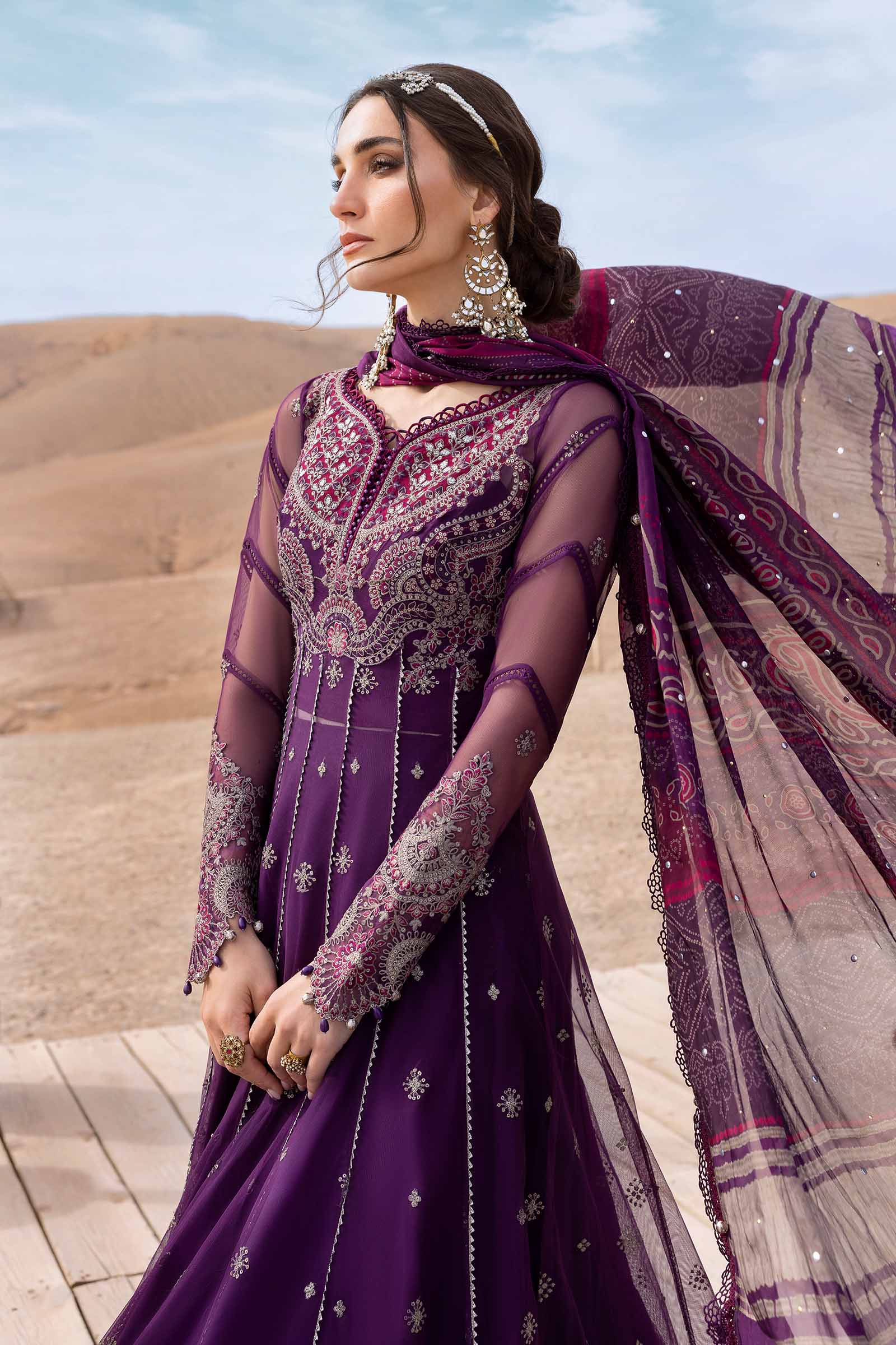 Shop Maria B unstitched embroidered suit from the Luxury Lawn 2025 collection—featuring premium fabrics, elegant detailing, and festive-ready designs for Eid and summer events.