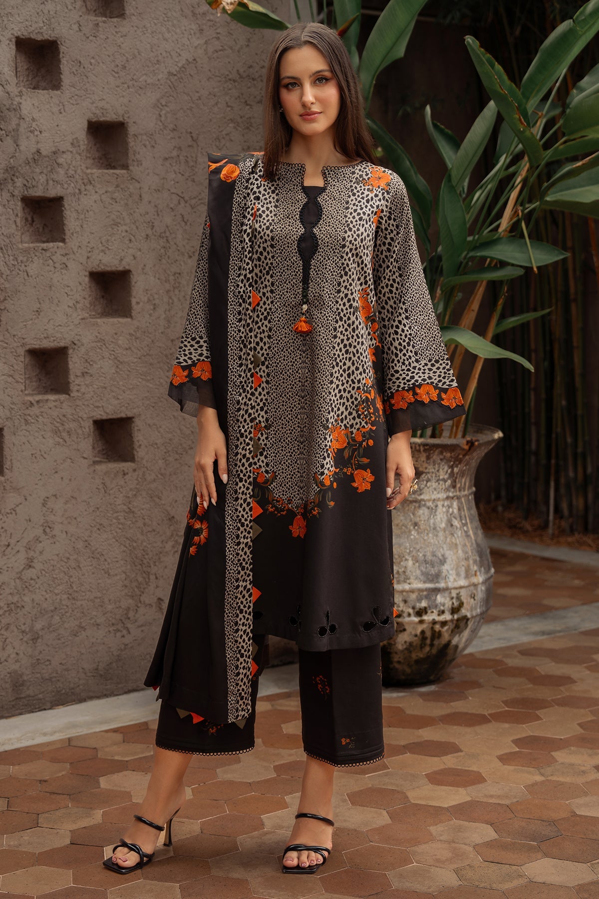 	Charizma CPrint printed linen suits with shawl
• 	Charizma CPrint staple shirt and trouser set