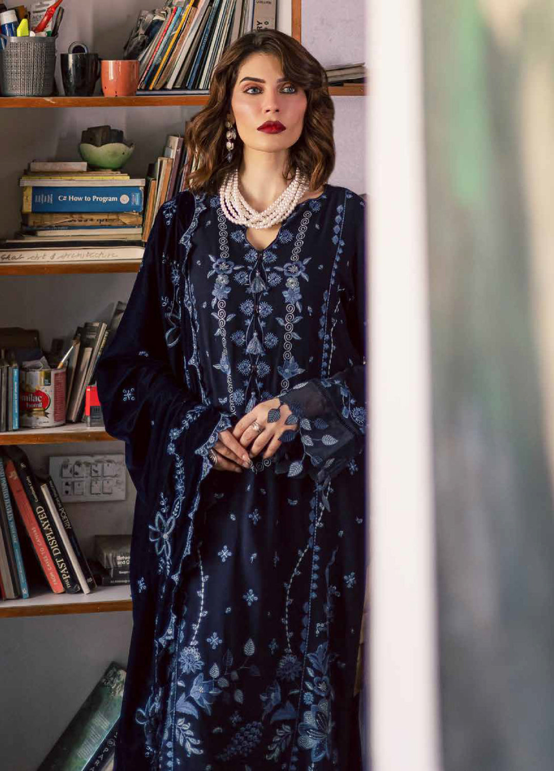 nureh leather peach embroidered winter suit for women  
nureh leather peach unstitched 3-piece suit with velvet shawl  
