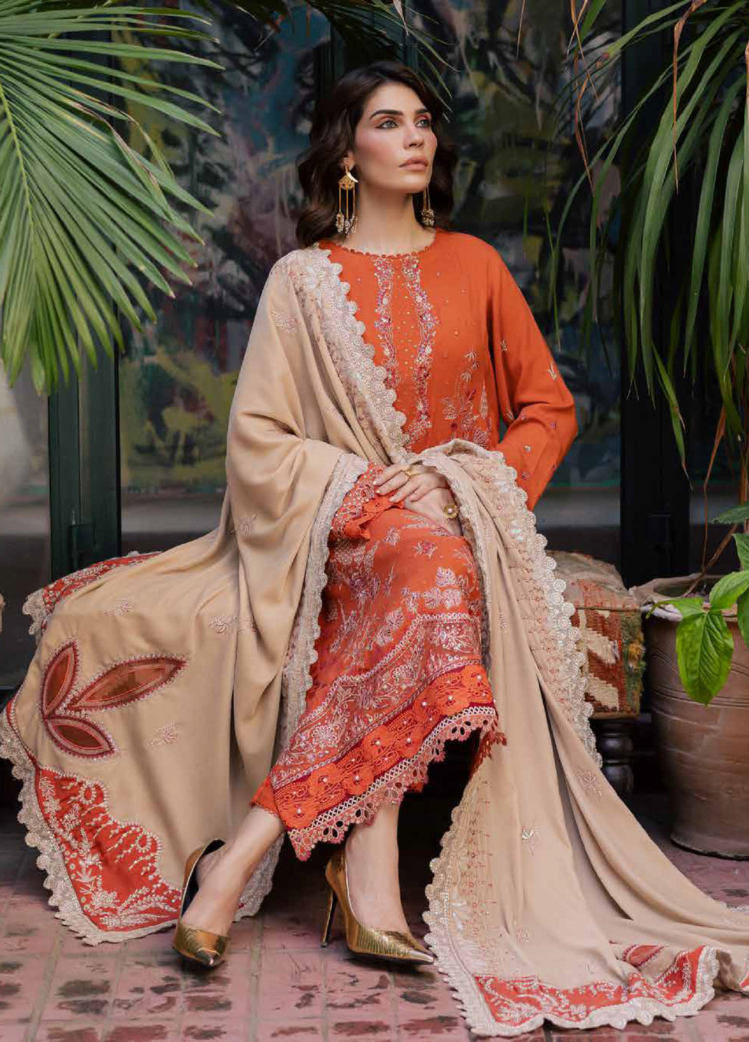 nureh leather peach embroidered winter suit for women  
nureh leather peach unstitched 3-piece suit with velvet shawl  

