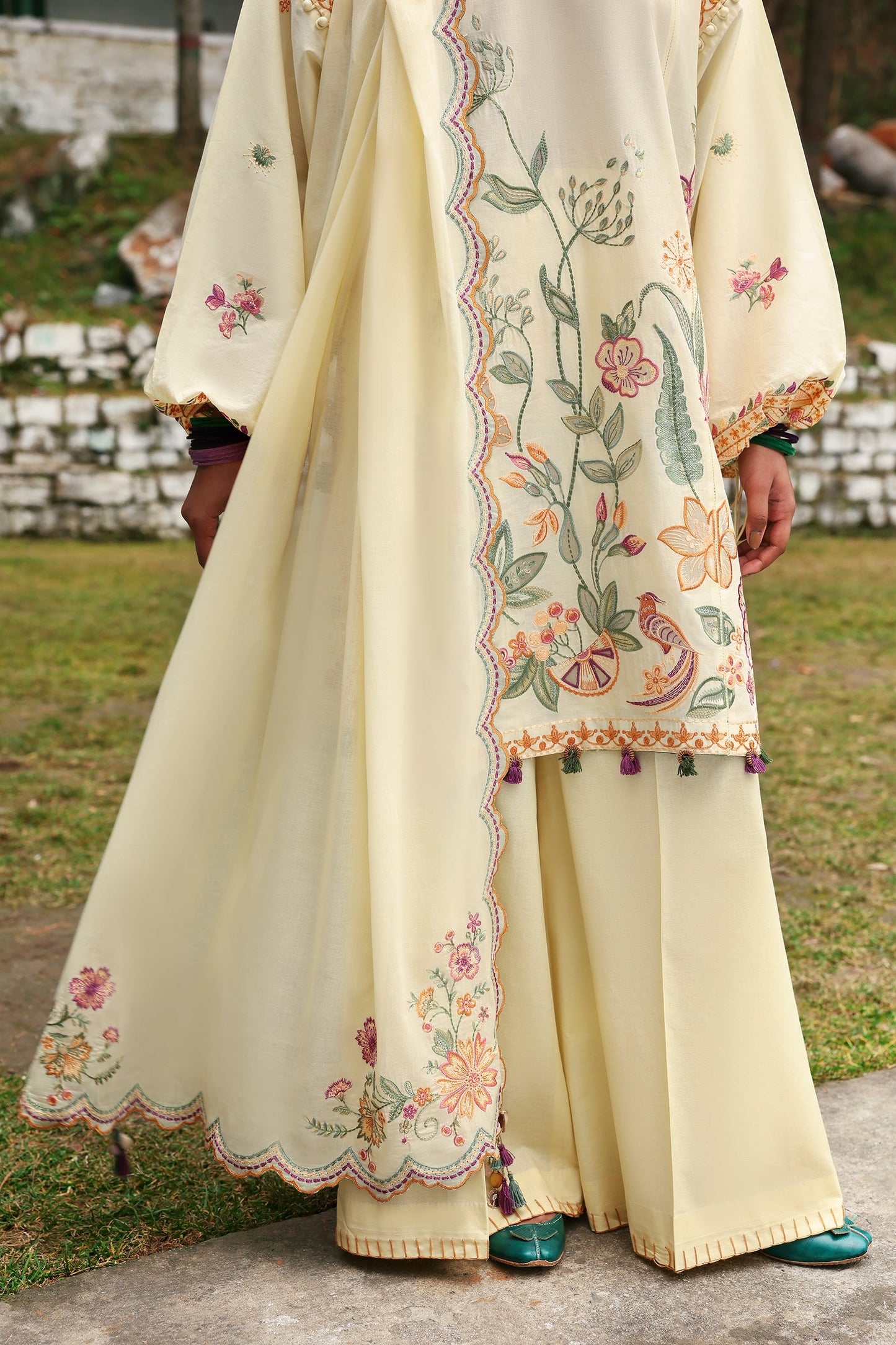 Unstitched embroidered lawn suit with voile dupatta and cambric trousers—ideal for festive wear and summer fashion.