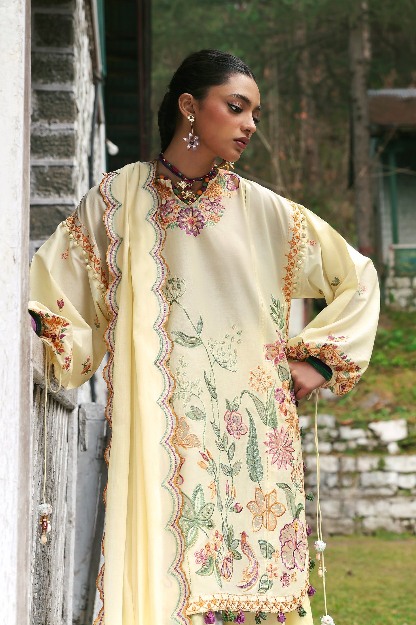 Unstitched embroidered lawn suit with voile dupatta and cambric trousers—ideal for festive wear and summer fashion.