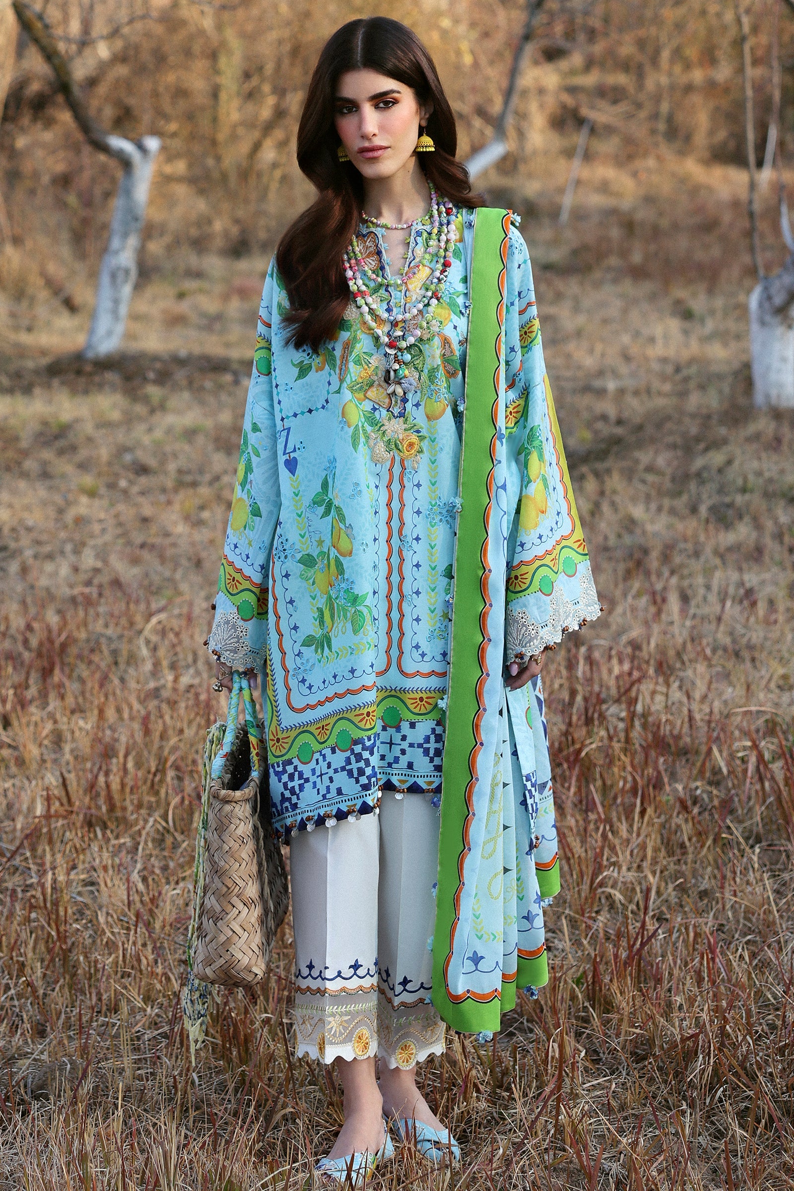 Zaha Summer 2025 unstitched embroidered lawn suit with digital prints and voile dupatta, perfect for festive wear.